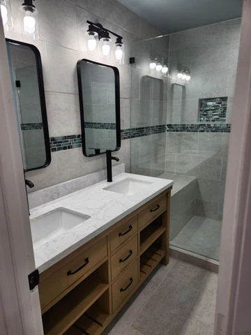 Double vanity with quartz counter in a Dallas, TX bathroom remodel