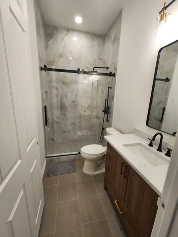 Primary bathroom suite remodel in Plano, TX with double vanity and walk-in shower