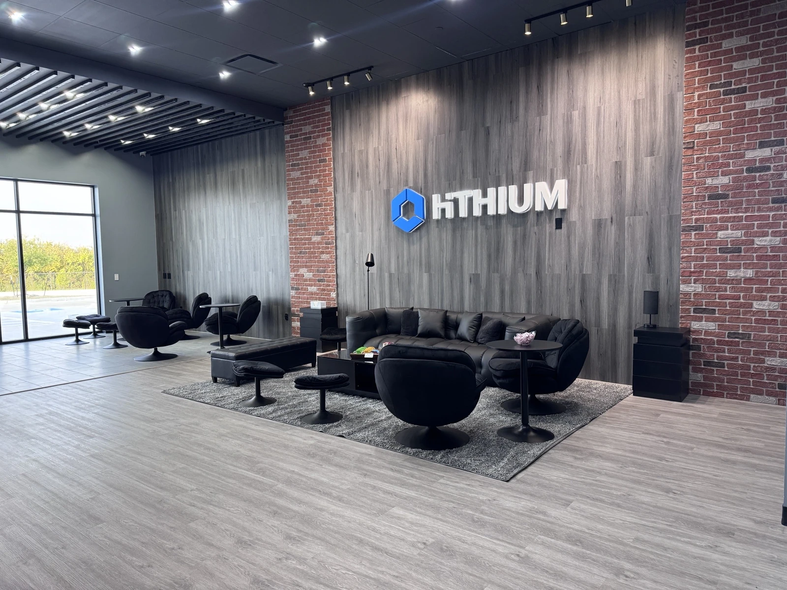 Commercial showroom feature wall and lounge seating in Mesquite, TX