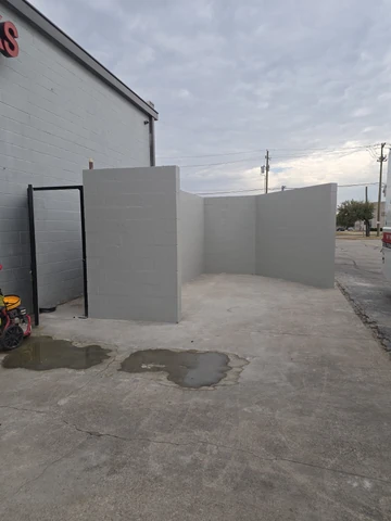 Masonry enclosure built at a commercial property in the DFW Metroplex