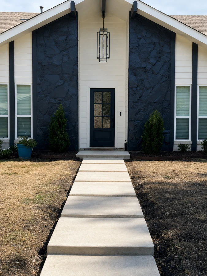 The same Richardson, TX home after exterior renovation with painted stone and new walkway