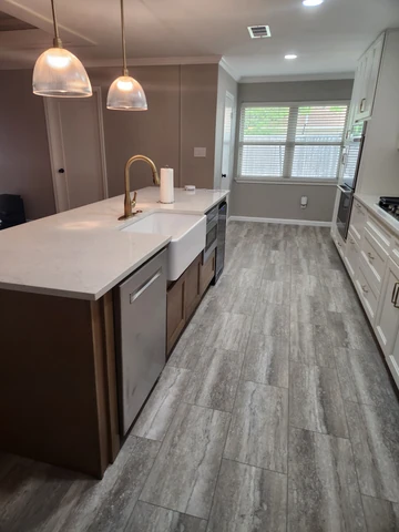 Modern kitchen remodel in Richardson, TX with a large center island